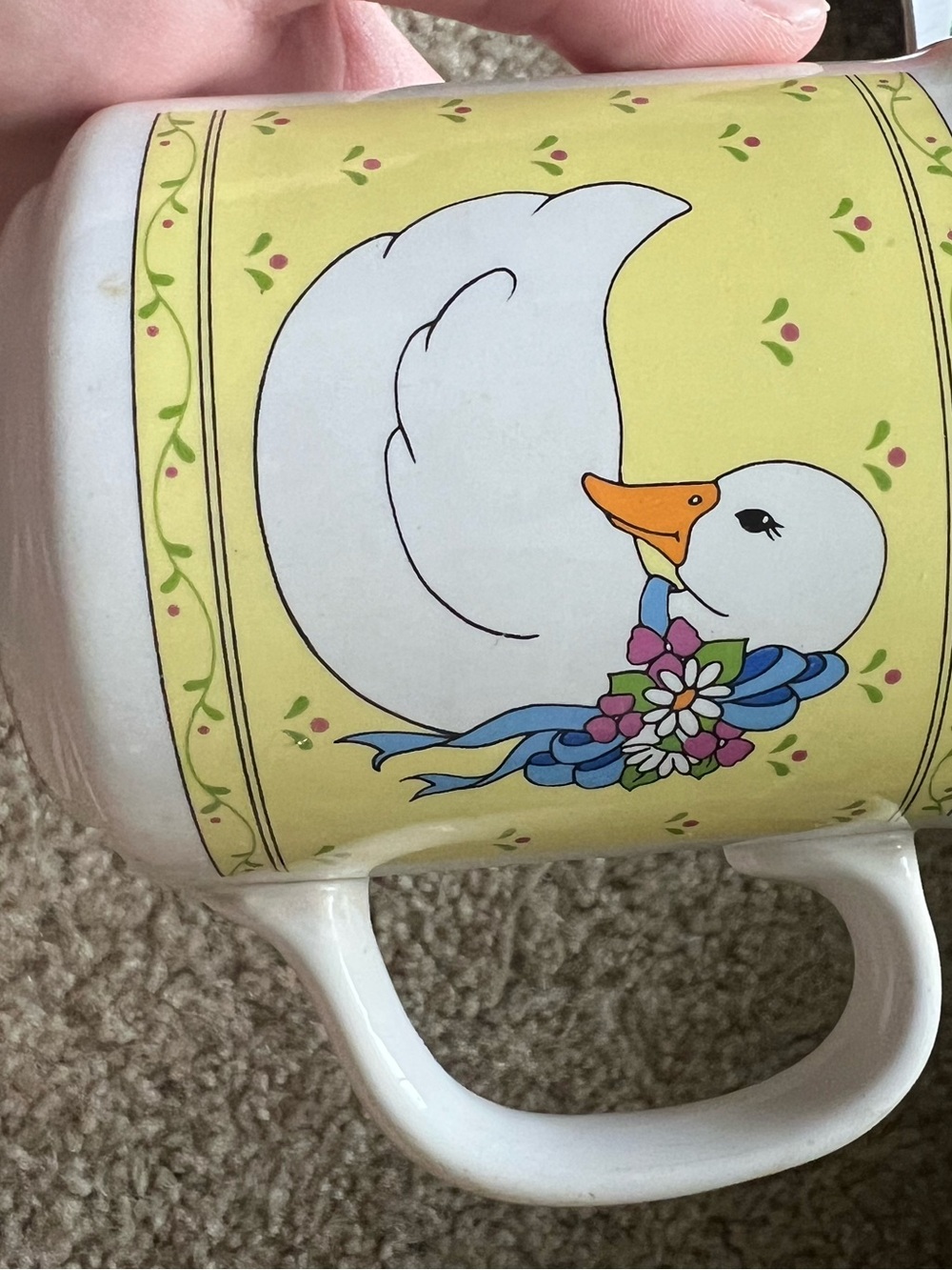 Yellow Duck Ceramic Mug with Floral Bow - Unknown Brand. Cracks on side of mug